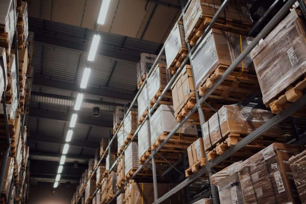 Liquidation pallets in a warehouse ready for local pickup or nationwide shipping
