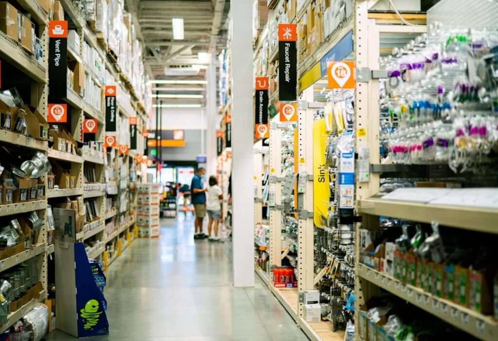 Retail store aisle representing general merchandise from Target, Walmart, and Home Depot liquidation pallets